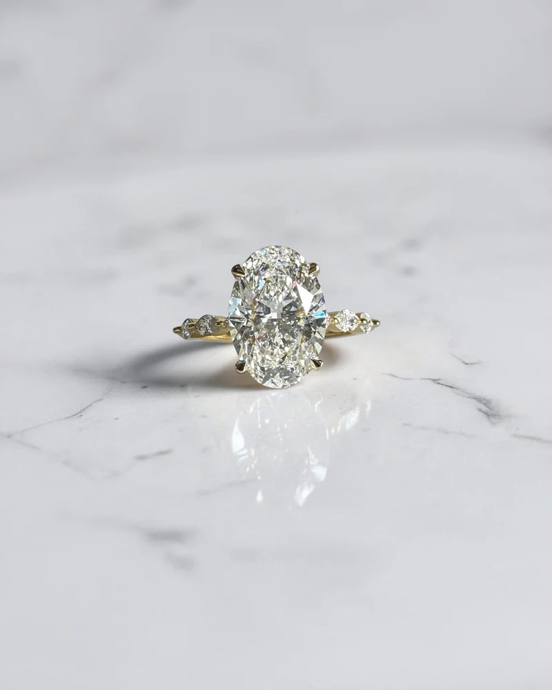  Exquisite Oval Diamond Engagement Ring with Two-Tone Cathedral Style