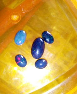  Black Fire Opal Gemstones are available